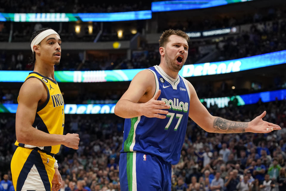 Dallas Mavericks guard Luka Doncic (77) reacts to a foul call during the second half of NBA basketball game against the Indiana Pacers in Dallas, Tuesday, Feb. 28, 2023. (AP Photo/Sam Hodde)