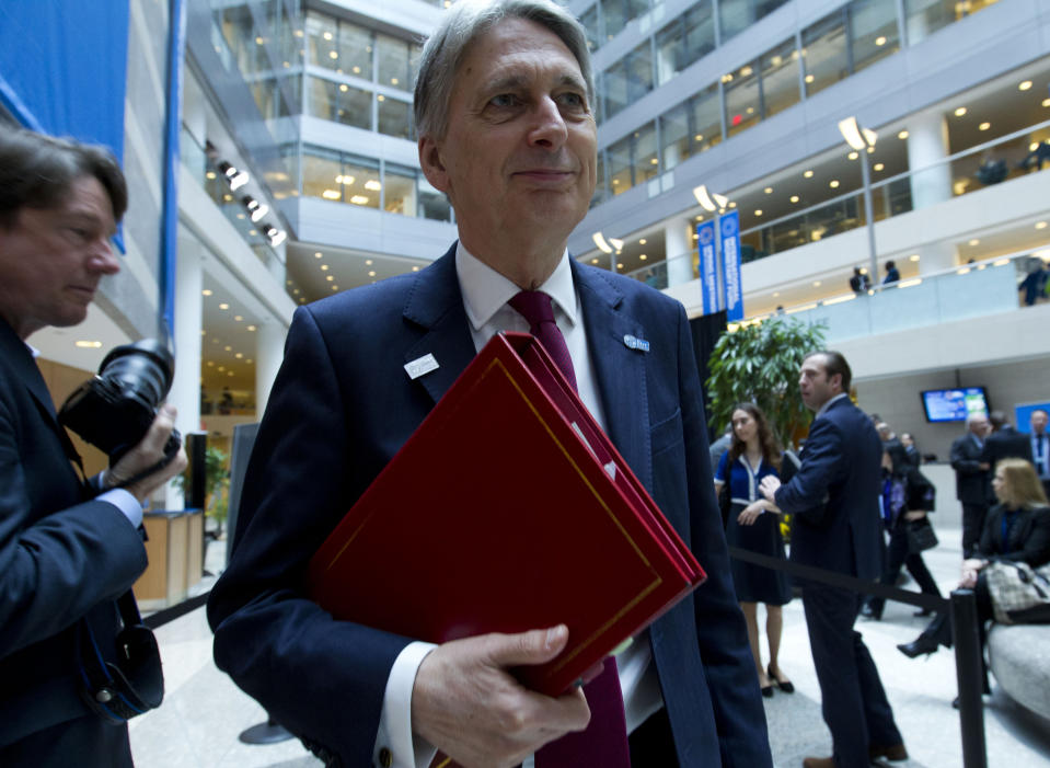 U.K. Chancellor of the Exchequer Philip Hammond attends the International Monetary and Financial Committee (IMFC) conference, at the World Bank/IMF Spring Meetings in Washington, Saturday, April 13, 2019. (AP Photo/Jose Luis Magana)