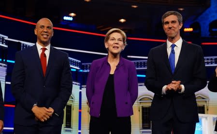 Candidates pose together before the start of the first U.S. 2020 presidential election Democratic candidates debate in Miami, Florida, U.S.,