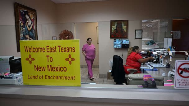 PHOTO: A sign welcoming patients from East Texas to New Mexico is displayed in the waiting area of the Women's Reproductive Clinic, which provides legal medication abortion services, in Santa Teresa, N.M., June 15, 2022.  (Robyn Beck/AFP via Getty Images, FILE)