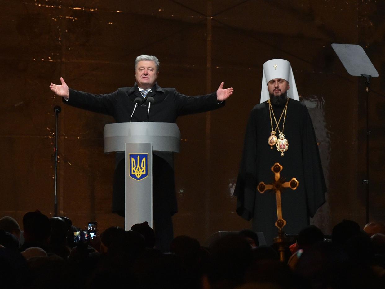Ukraine's leader celebrates the historic split from Moscow Orthodoxy: AFP/Getty