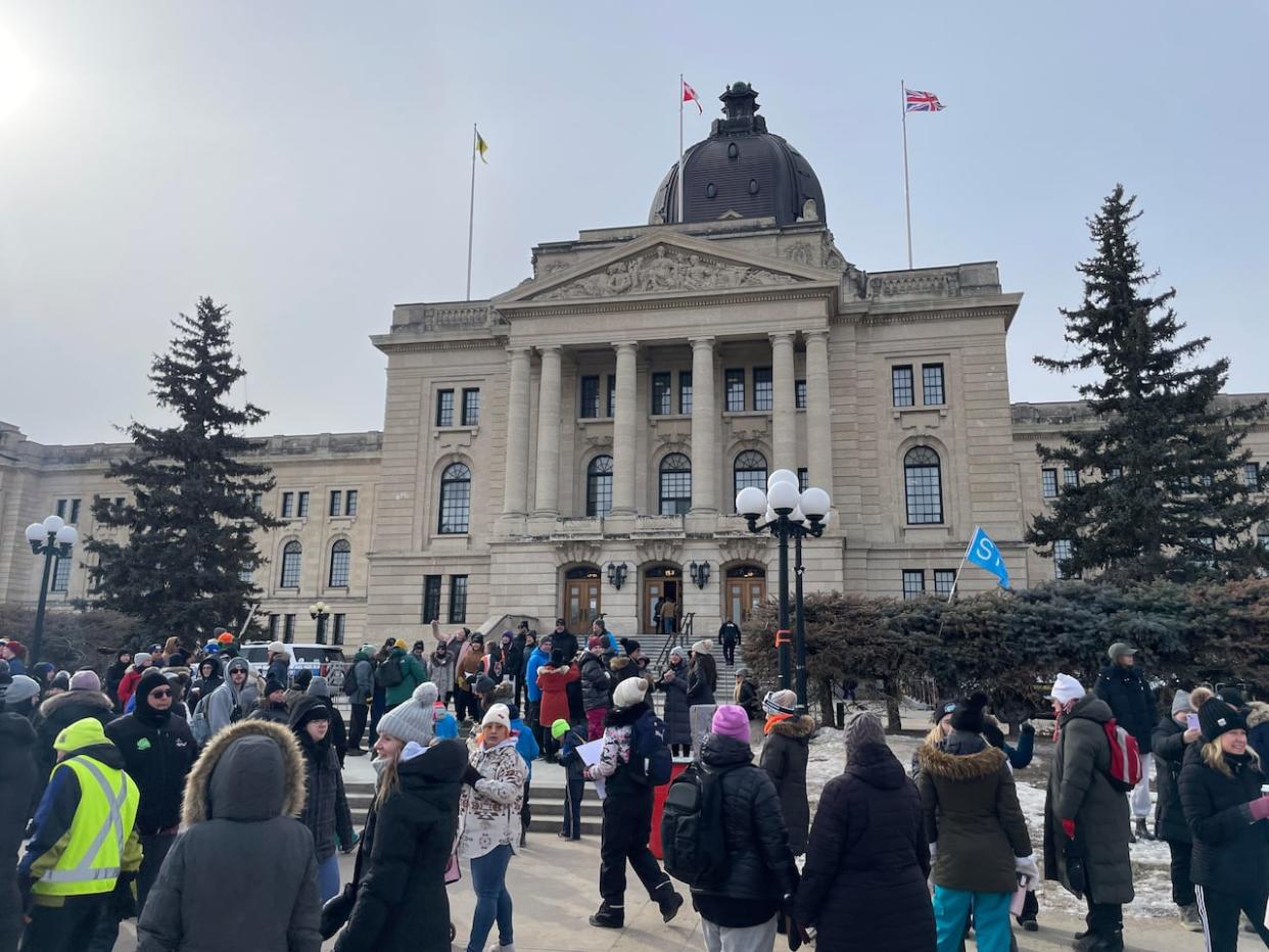 Saskatchewan teachers and supporters rallied outside the Saskatchewan Legislature on Wednesday as teachers held a one-day strike on the same day as the provincial budget. (Sacha-Wilky Merazil/CBC - image credit)