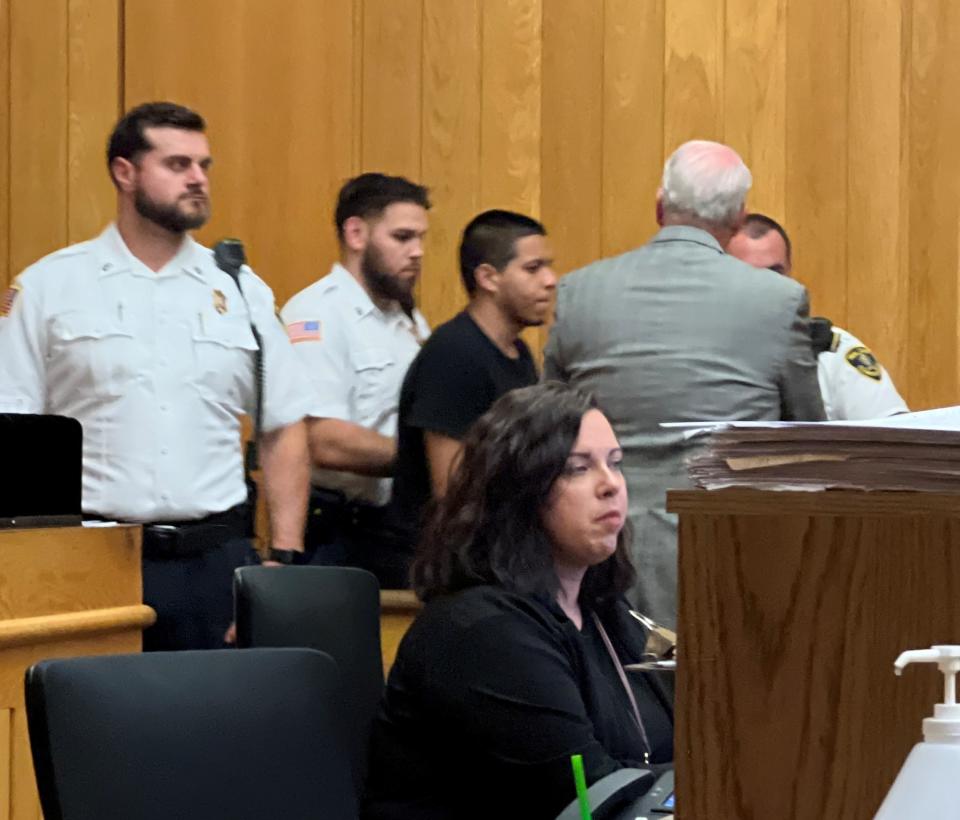 Xavier Luis Rodriguez, third from left, was ordered held without bail after arraignment Friday in New Bedford District Court.