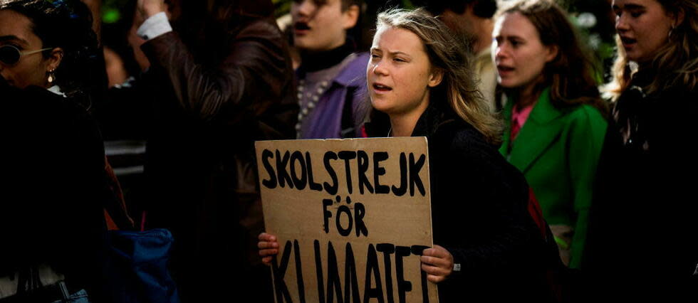 Greta Thunberg s'est fait connaitre du monde entier en 2018 pour avoir protesté devant le Parlement suédois contre son inaction climatique.  - Credit:JONATHAN NACKSTRAND / AFP