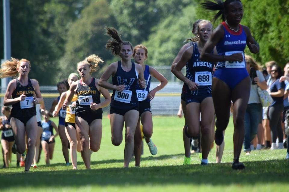 Natick High alum and Westfield State University freshman Julianne Kelly (center) was named the MASCAC Rookie and Runner of the Week after her performance at the UMass Dartmouth Invitational on Sept. 17, 2022.