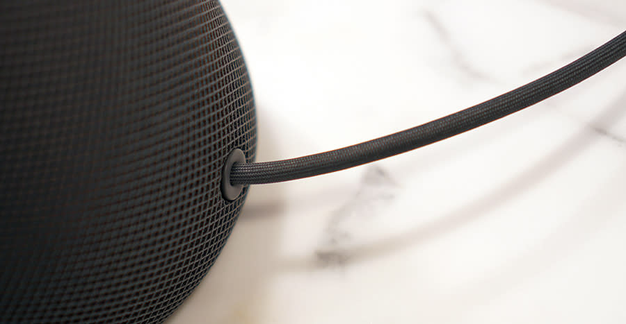 The HomePod’s cord is wrapped in fabric, too.