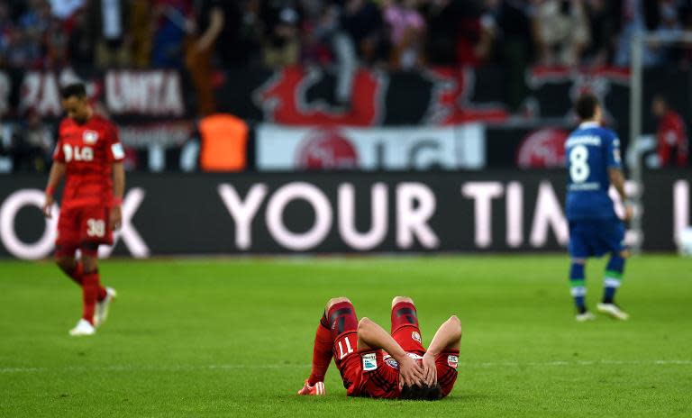 Leverkusen's defender Sebastian Boenisch reacts after the German first division Bundesliga football match Bayer 04 Leverkusen vs VfL Wolfsburg in Leverkusen, western Germany on February 14, 2015