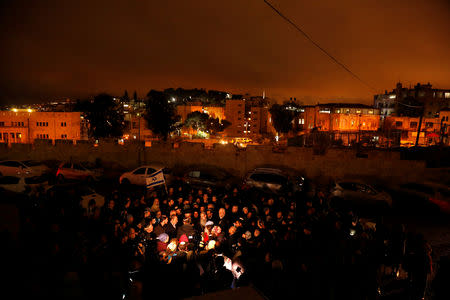 Israeli mourners attend the funeral of a baby who died after being delivered prematurely following a shooting attack near the Israeli settlement of Ofra, in the Israeli-occupied West Bank, at Mount of Olives cemetery in Jerusalem December 12, 2018. REUTERS/Ronen Zvulun