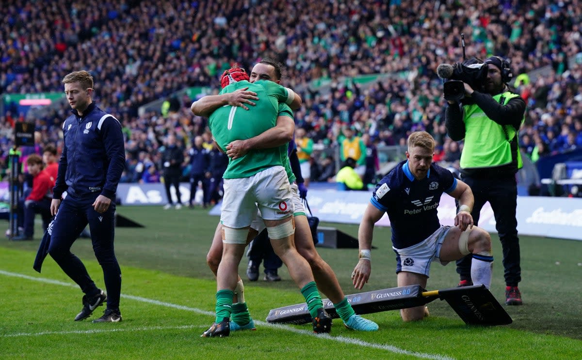 Ireland’s James Lowe celebrates scoring in the corner for their second try (PA)