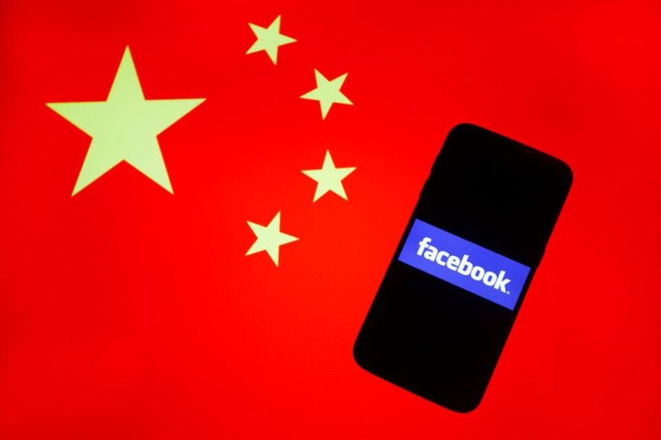 Flag of China with iphone and facebook logo