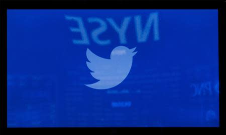 A screen displays the Twitter logo ahead of the company's IPO on the floor of the New York Stock Exchange, November 6, 2013. Twitter Inc priced its initial public offering above its expected range to raise at least $1.8 billion, in a sign of strong investor demand for the most highly anticipated U.S. public float since Facebook Inc. REUTERS/Brendan McDermid