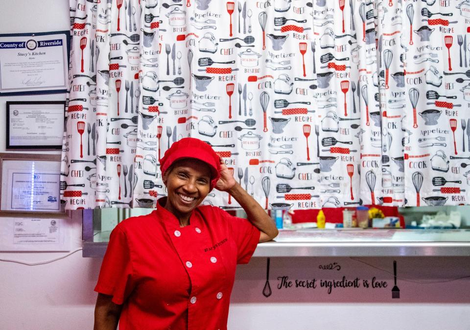 Stacy Rene Davis behind the counter of her Blythe soul food restaurant, Stacy's Kitchen, in September 2022.