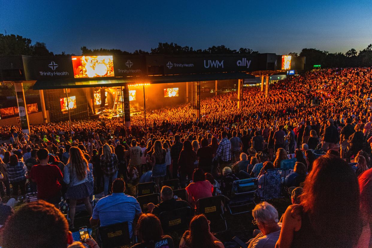 Fans attend a concert at Pine Knob Music Theatre in summer 2022.