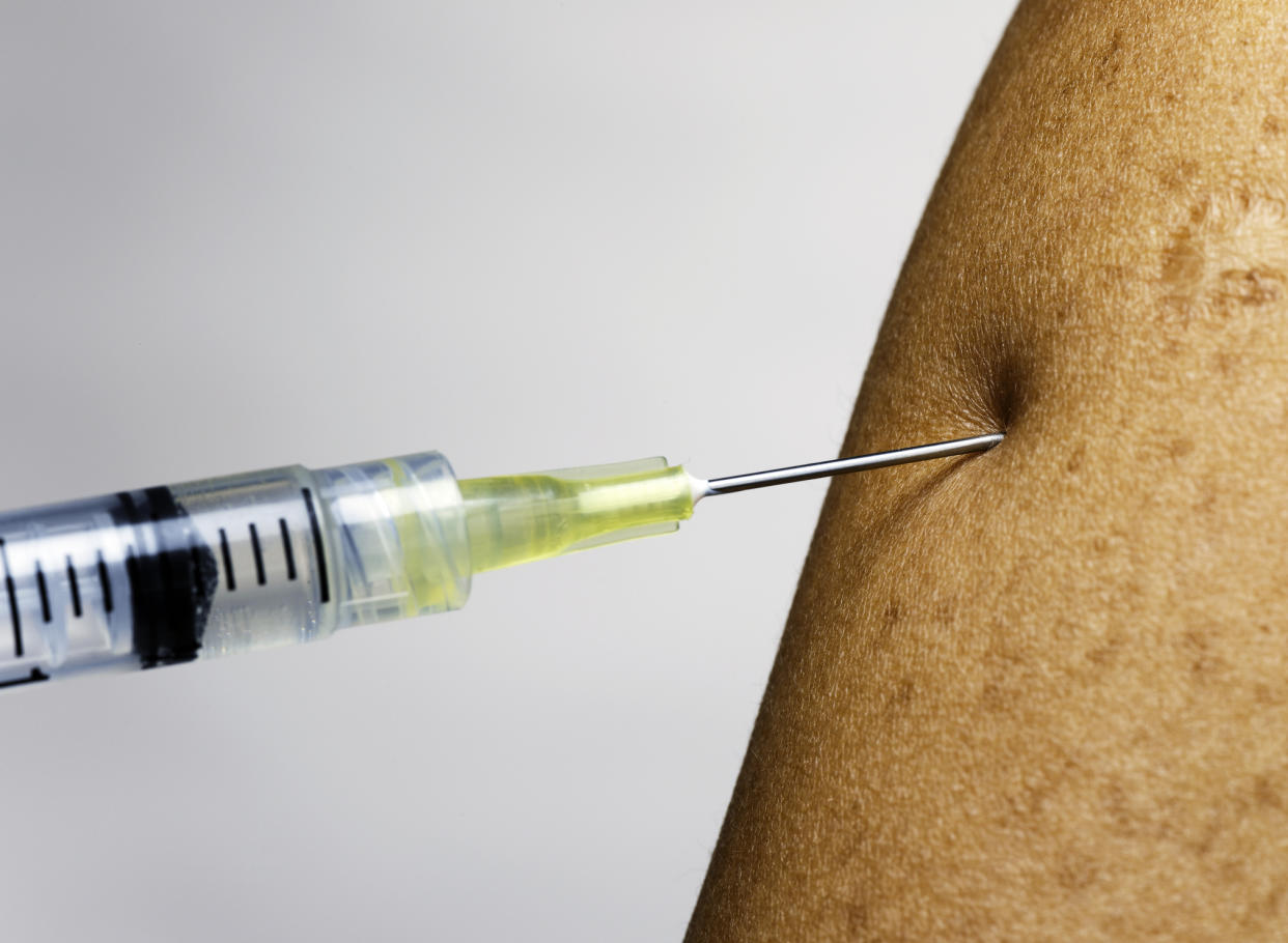 Image of adult getting the flu vaccine, as it is announced the programme is being brought forward this year. (Getty Images)