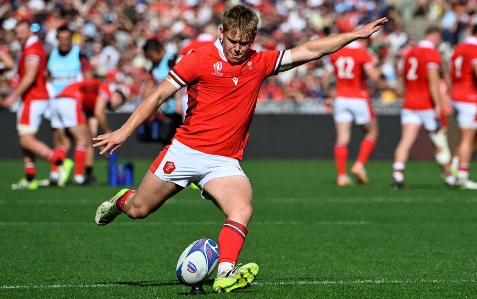 Wales' fly-half Sam Costelow takes a conversion for a try during the France 2023 Rugby World Cup Pool C match between Wales and Georgia