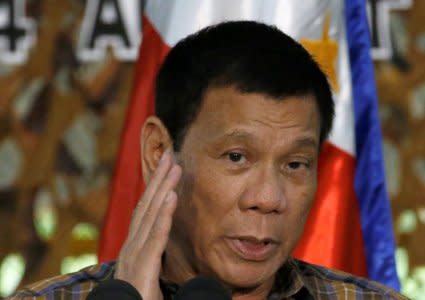 Philippine President Rodrigo Duterte speaks during a meeting with soldiers at Camp Capinpin in Tanay, Rizal in the Philippines August 24, 2016. REUTERS/Erik De Castro