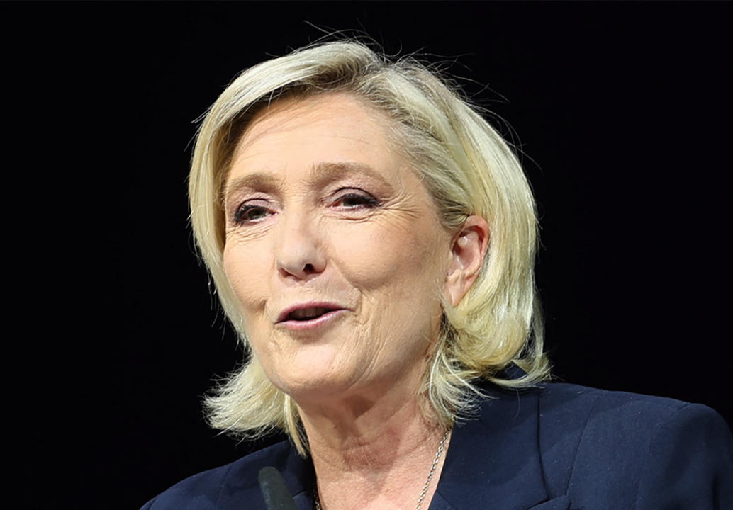 Former president of the French far-right Rassemblement National (RN) parliamentary group Marine Le Pen gives a speech during the results evening of the first round of the parliamentary elections in Henin-Beaumont, northern France, on June 30, 2024. A divided France is voting in high-stakes parliamentary elections that could see the anti-immigrant and eurosceptic party of Marine Le Pen sweep to power in a historic first. The candidates formally ended their frantic campaigns at midnight June 28, with political activity banned until the first round of voting. (Photo by FRANCOIS LO PRESTI / AFP) (Photo by FRANCOIS LO PRESTI/AFP via Getty Images)