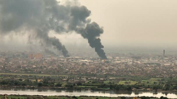 PHOTO: This image grab taken from AFPTV video footage on April 28, 2023, shows an aerial view of black smoke rising over Khartoum. (AFPTV/AFP via Getty Images)