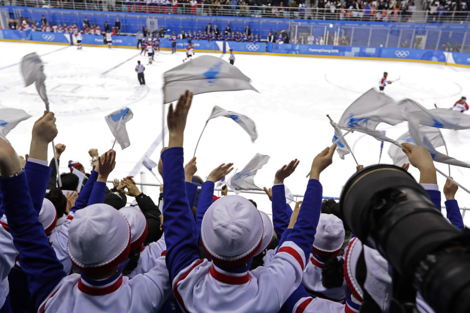 Supporters cheer after Randi Heeso Griffin scored the unified Korean team’s only goal of the tournament. (AP)