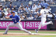 Kansas City Royals first baseman Vinnie Pasquantino (9) forces out New York Yankees' Aaron Hicks (31) during the first inning of a baseball game, Saturday, July 30, 2022, in New York. (AP Photo/Mary Altaffer)