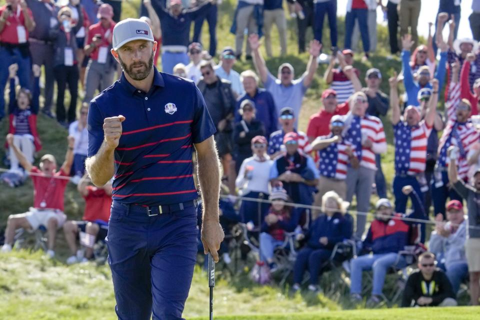 Team USA's Dustin Johnson reacts after winning the 11th hole during a four-ball match the Ryder Cup at the Whistling Straits Golf Course Friday, Sept. 24, 2021, in Sheboygan, Wis. (AP Photo/Ashley Landis)