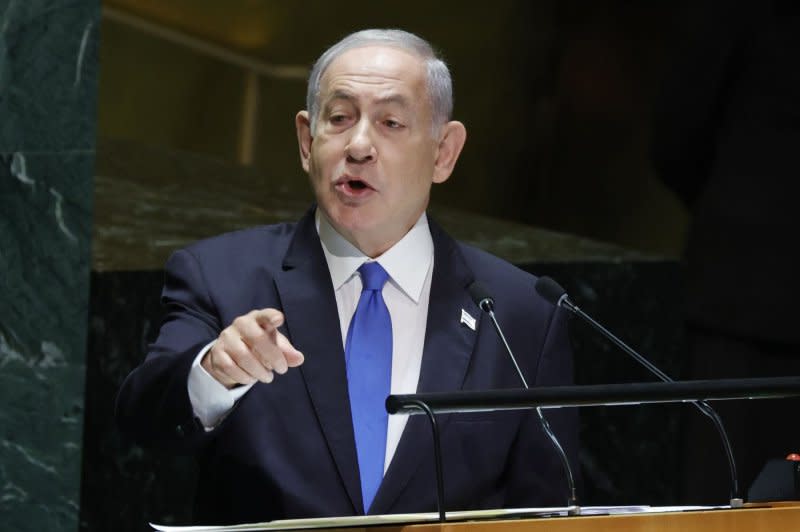Israeli Prime Minister Benjamin Netanyahu (pictured at the United Nations in September) formed an emergency government Wednesday with critic and former Defense Minister Benny Gantz. File Photo by John Angelillo/UPI