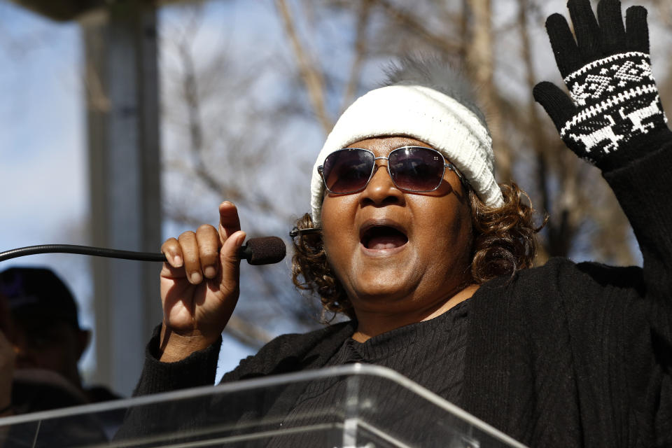 Jamie Scott leads a chant at a prison reform rally outside the Mississippi Capitol in Jackson, Miss., Friday, Jan. 24, 2020. Scott and her sister Gladys Scott, spent 16 years at the Central Mississippi Correctional Facility for a 1993 convenience store robbery. The rally protested dangerous and unhealthy prison conditions within the state prison system. A number o inmates have been killed in violent clashes in recent weeks at those facilities. (AP Photo/Rogelio V. Solis)