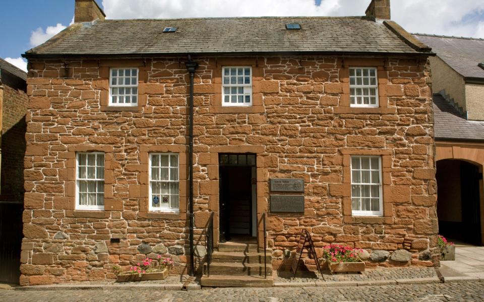 outside Robert Burns' house in Dunpris & Galloway