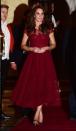 <p>Kate arrived at a West End show in a £1105 crimson red gown by Marchesa Notte.<br><i>[Photo: PA]</i> </p>