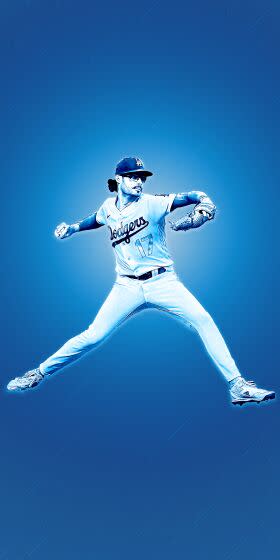 Dodgers relief pitcher Joe Kelly throws to a Reds batter