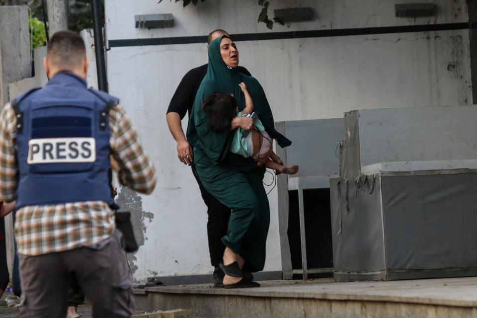 Palestinian citizens are displaced from their homes as a result of Israeli air strikes on October 9, 2023 in Gaza City, Gaza.