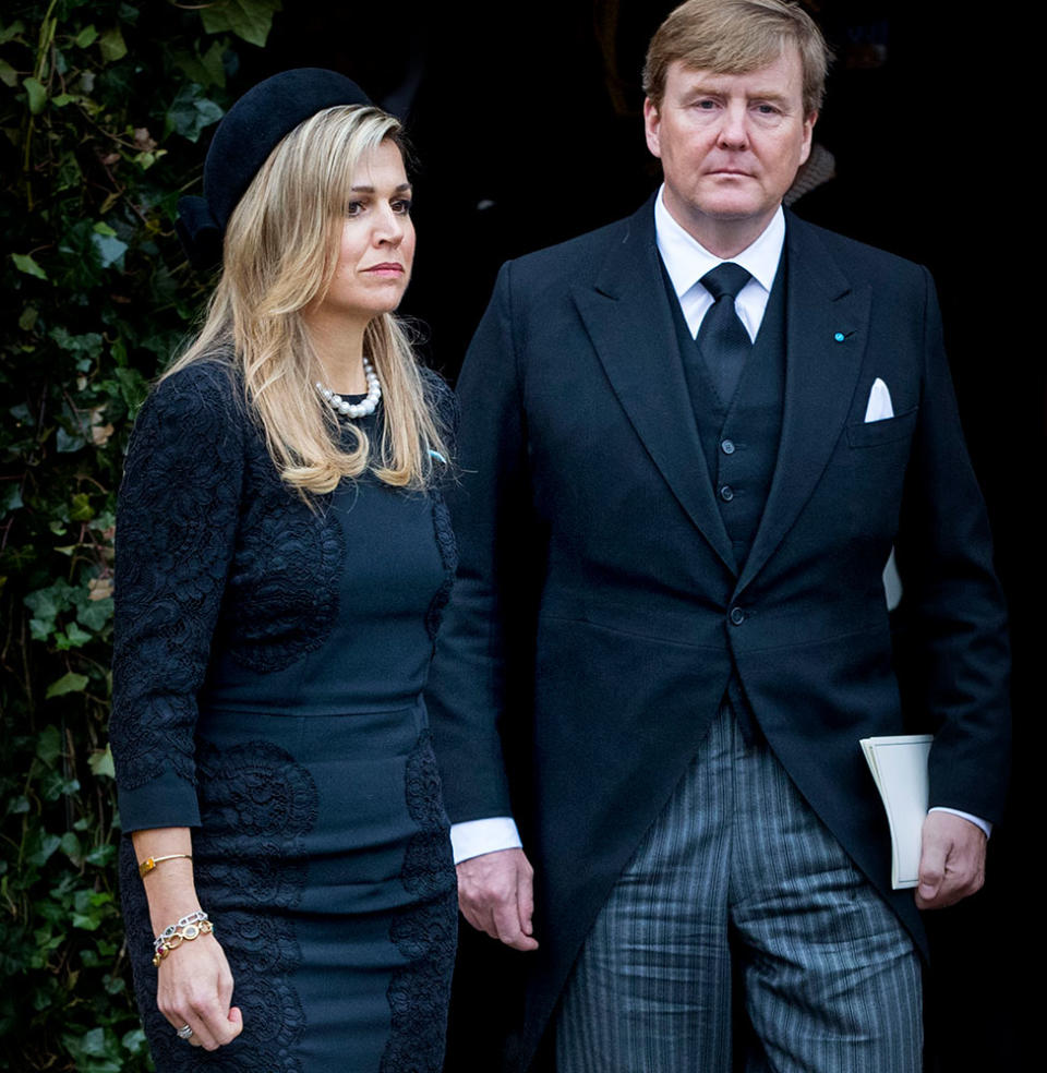 King Willem-Alexander and Queen Maxima looking sad at funeral wearing black clothes