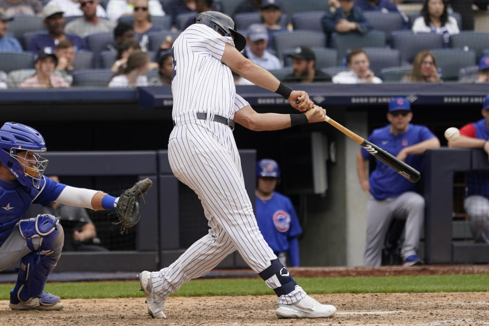 New York Yankees' Matt Carpenter hits a two-run home run in the sixth inning of a baseball game against the Chicago Cubs, Sunday, June 12, 2022, in New York. (AP Photo/Mary Altaffer)