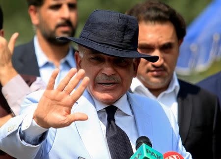 FILE PHOTO: Shahbaz Sharif, Chief Minister of Punjab Province and brother of Pakistan's Prime Minister Nawaz Sharif, gestures after appearing before a Joint Investigation Team (JIT) in Islamabad, Pakistan June 17, 2017. REUTERS/Faisal Mahmood/File Photo