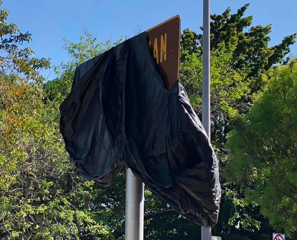 Black plastic obscures what looks like a Tubman Highway sign where U.S. 1 meets I-95 in Miami. A Florida Transportation Department spokeswoman said the state installed signs adding Harriet Tubman’s name to the highway, but that they will remain covered up until Coral Gables joins other cities with jurisdiction over parts of U.S. 1 in endorsing the addition. Gables commissioners narrowly rejected adding the Tubman name in January. The change is the first step in what advocates hope will be the retiring of the Dixie Highway name on U.S. 1 as well.