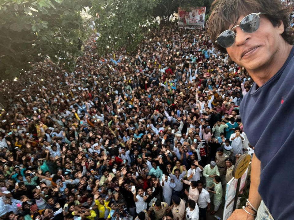 Shah Rukh Khan takes a selfie with the sea of fans gathered at his home Mannat in Mumbai. — Picture from Instagram/ iamsrk