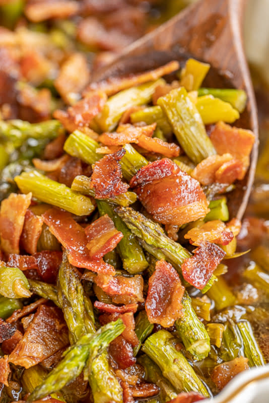 <p>Plain Chicken</p><p>Bacon, brown sugar and butter make this a crowd-pleaser.</p><p><strong>Get the recipe: <a href="https://www.plainchicken.com/2018/08/smothered-asparagus.html" rel="nofollow noopener" target="_blank" data-ylk="slk:Smothered Asparagus;elm:context_link;itc:0;sec:content-canvas" class="link ">Smothered Asparagus</a> </strong></p>