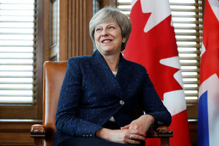 Britain's Prime Minister Theresa May takes part in a meeting with Canada's Prime Minister Justin Trudeau (not pictured) on Parliament Hill in Ottawa, Ontario, Canada, September 18, 2017. REUTERS/Chris Wattie