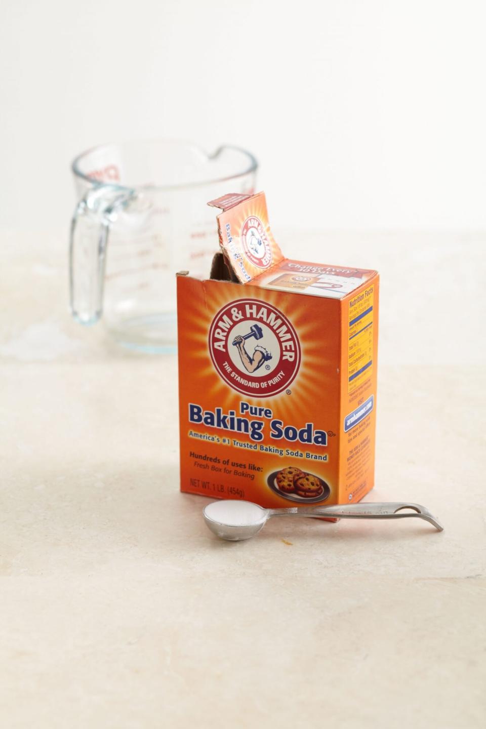 arm &amp; hammer baking soda on slate surface