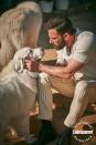 <p>Affleck talks it out with Moose, a friendly Samoyed, on the set of EW's cover shoot on Dec. 8, 2021, in Los Angeles.</p>