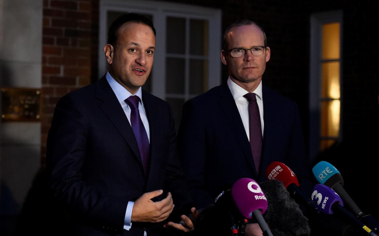 Ireland's Deputy Prime Minister Simon Coveney, right, warned those pursuing Brexit they could be undermining the foundations of a fragile peace process in Northern Ireland - REUTERS