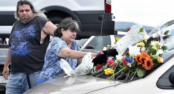 Flowers left on the vehicle of William and Janice Bright as a memorial were gathered by William Bright’s sister Karen Abbot. Source: ABACA via AAP