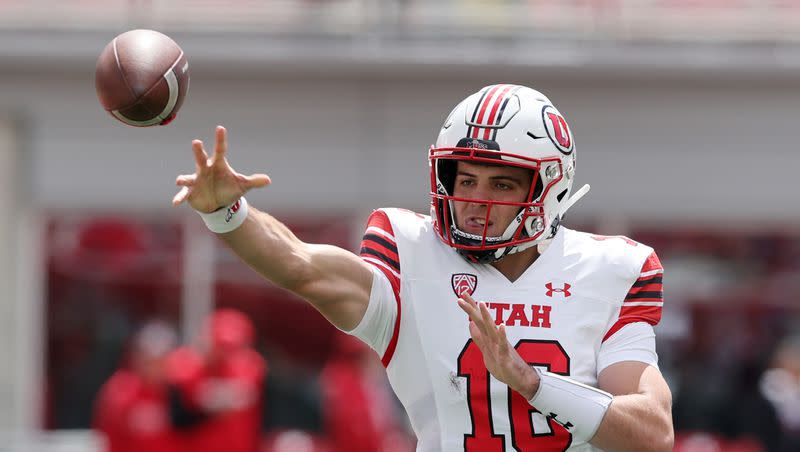 White team quarterback Bryson Barnes passes the ball during the University of Utah’s Red and White game at Rice-Eccles Stadium in Salt Lake City on Saturday, April 23, 2022.