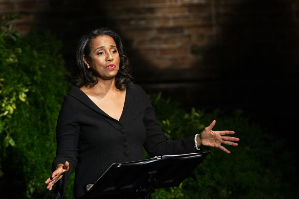 Suzanne Kay, daughter of actress Diahann Carroll, speaks to attendees during the memorial at the Helen Hayes Theater on Sunday, Nov. 24, 2019 in New York. (AP Photo/Eduardo Munoz Alvarez)