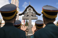 <p>Kremlin honor guards stand at a monument to Grand Duke Sergei Alexandrovich of Russia, governor general of Moscow between 1891 and 1905, during a ceremony in Moscow’s Kremlin, May 4, 2017. Targeted by the Social Revolutionary Combat Organization, Alexandrovich was assassinated by a terrorist bomb at the Kremlin. (Photo: Pavel Golovkin/AP) </p>