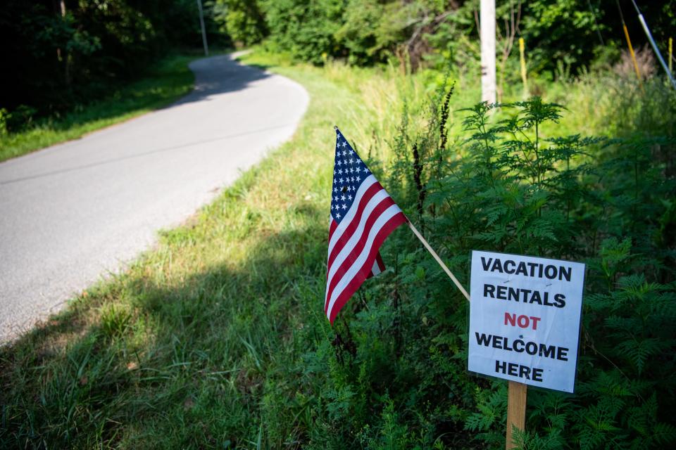 Lone Mountain Shores at Norris Lake is a neighborhood of divided signs. Anti-renter signs dot yards with phrases like "Vacation rentals not welcome here."