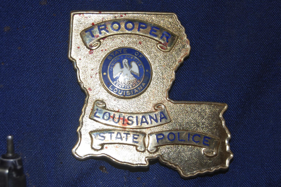 FILE - This May 10, 2019, file photo, provided by the Louisiana State Police shows blood stains on the shield and uniform of Master Trooper Chris Hollingsworth, in West Monroe, La., after troopers punched, dragged and stunned Black motorist Ronald Greene during his fatal 2019 arrest. (Louisiana State Police via AP, File)