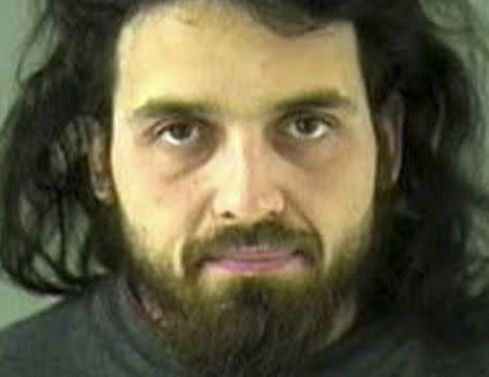 Michael Zehaf-Bibeau, 32, is seen in an undated picture from the Vancouver Police Department released by the Royal Canadian Mounted Police October 25, 2014. REUTERS/Vancouver Police Department/Handout