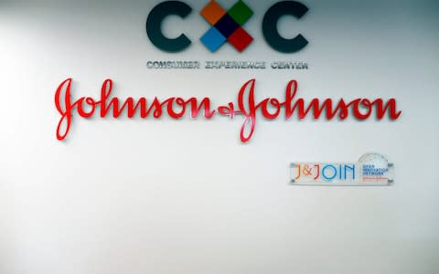  logo of US multinational medical devices and pharmaceutical company Johnson & Johnson  - Credit: CHARLY TRIBALLEAU/AFP