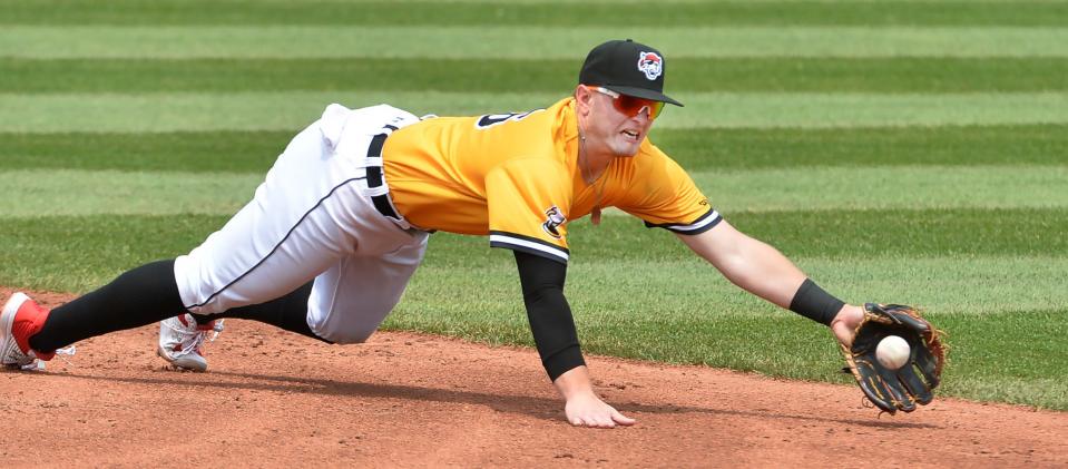 Erie SeaWolves infielder Jace Jung made a nice diving play to force an out against the Harrisburg Senators at UPMC Park in Erie on Aug. 2, 2023.